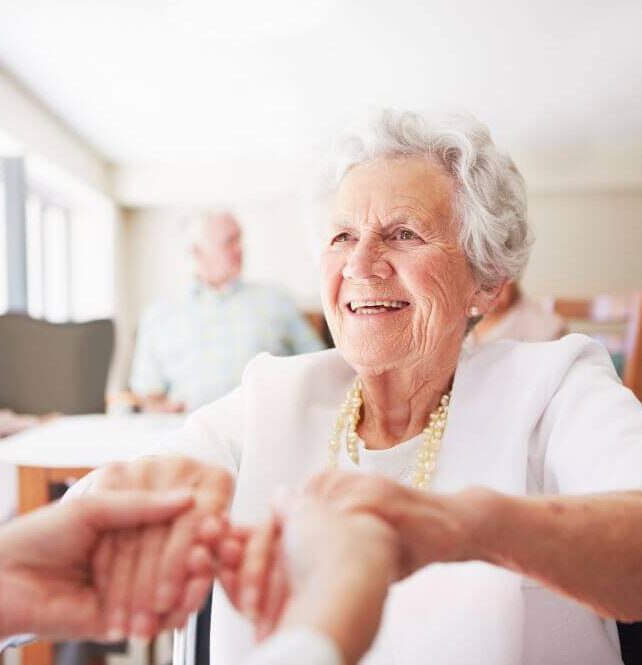 Senior In Wheelchair Smiling